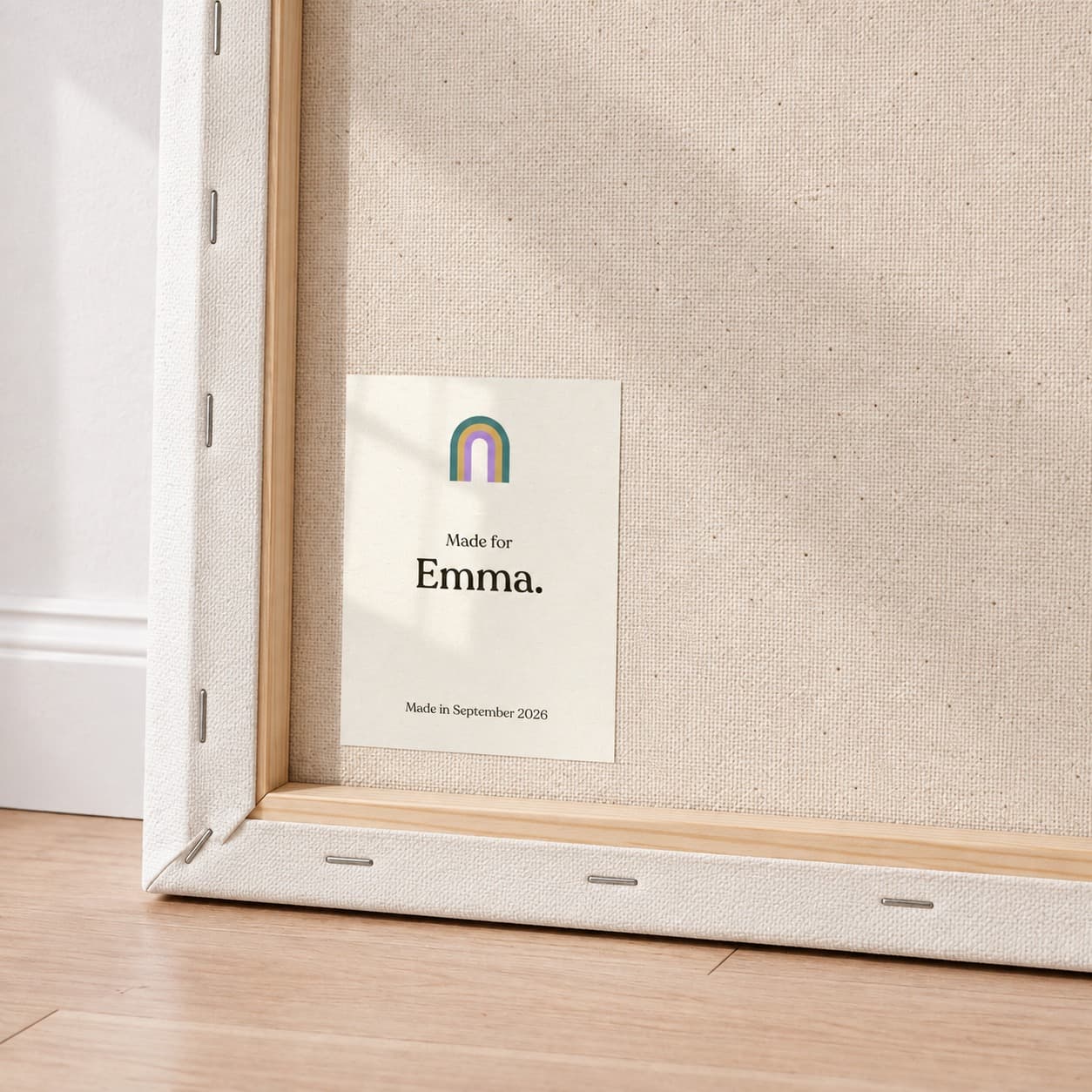 The back of the canvas, its label carrying the child's name