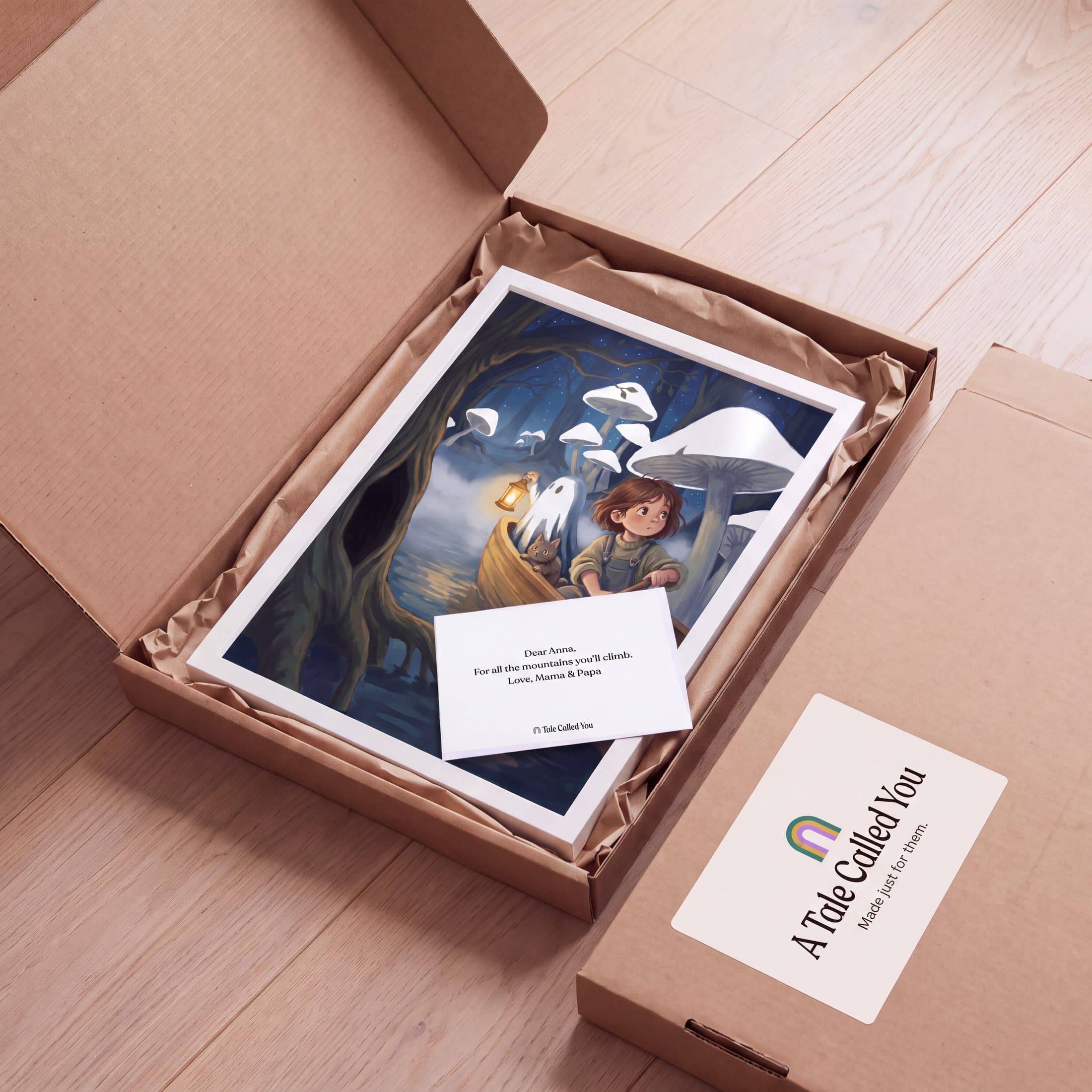 The framed story art lying in its opened shipping box on kraft paper